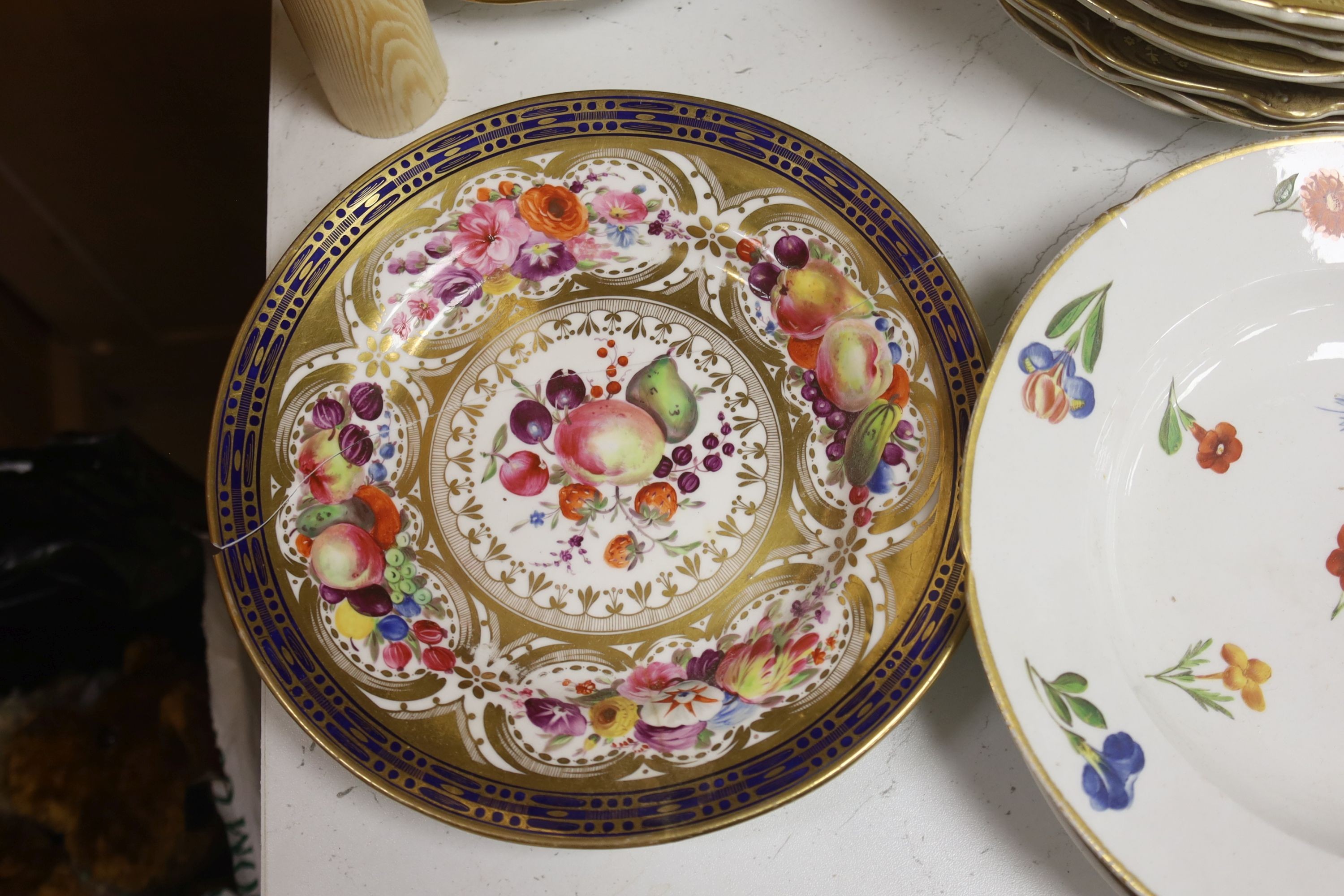 A collection of eight F & R Pratt landscape plates and six 19th-century porcelain plates